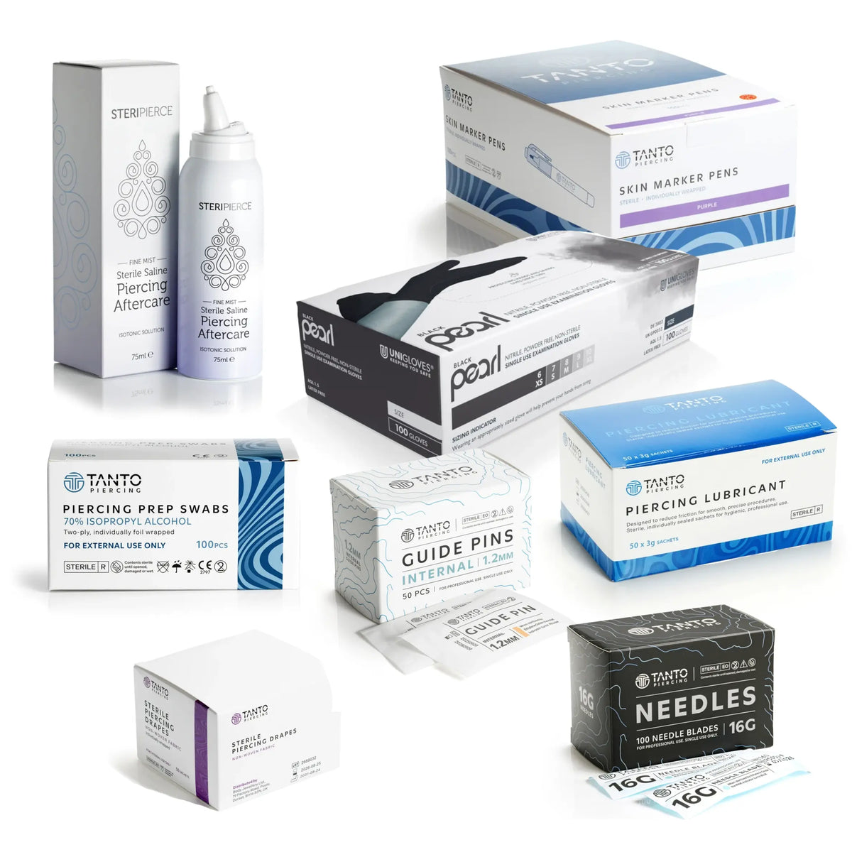 A collection of piercing studio supplies including Steriferce aftercare, Tanto piercing prep swabs, guide pins, needles, and skin marker pens in various retail packaging boxes on a white background.