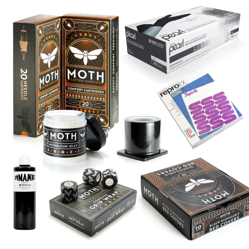 Tattoo Studio Essentials Bundle with Moth Fine Liner cartridges, black nitrile gloves, Dynamic Black Ink, Spirit stencil paper, petroleum jelly, barrier film, grip wrap and disposable bed covers on A WHITE BACKGROUND