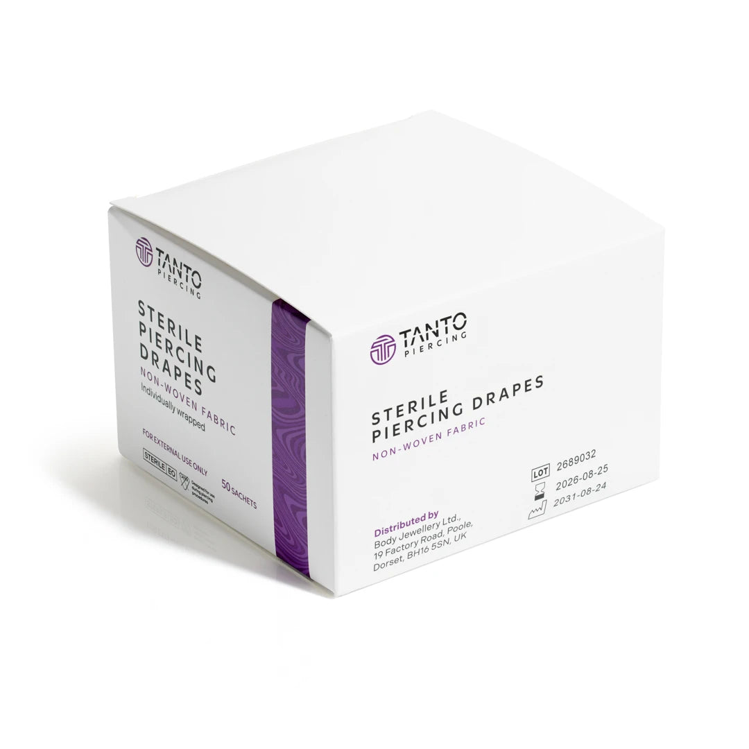 Box of Tanto Sterile Piercing Drapes box of 50 non-woven disposable drapes for professional piercing studios on a white background